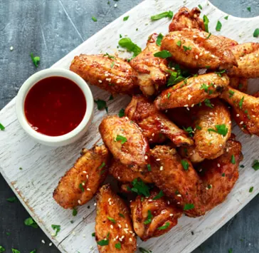 Chicken wings with a dipping sauce